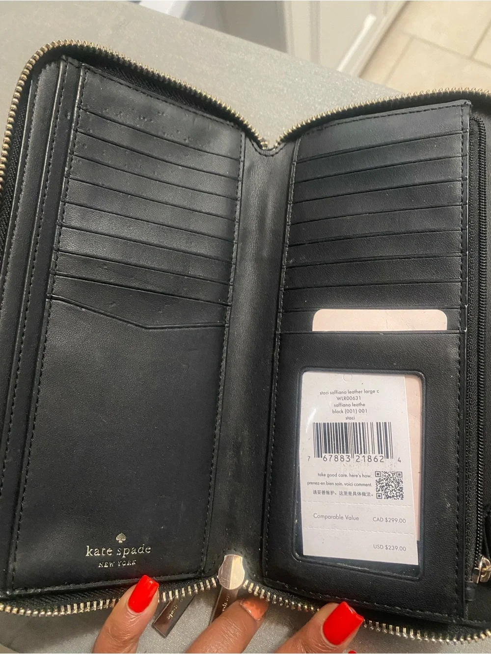 kate spade Black Zip-Around Saffiano Leather Wallet